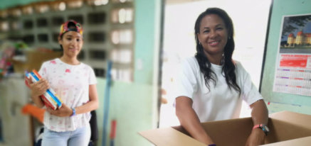 Delivering school books at Mamoni Arriba